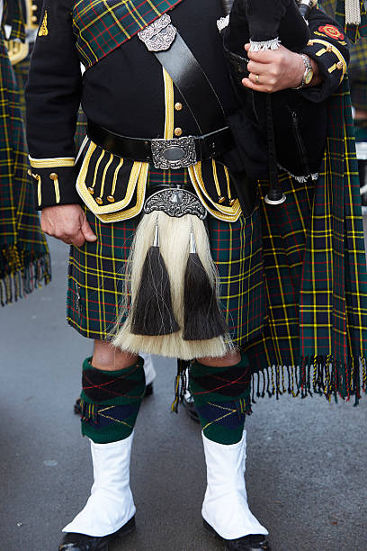 men in black kilt outfit