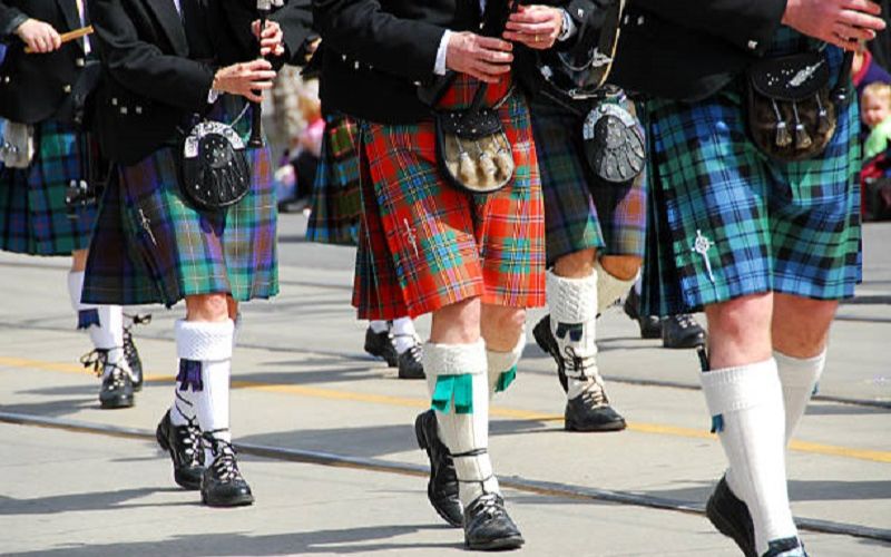 Comparison of Scottish and Irish kilts, their designs, patterns, and cultural significance.